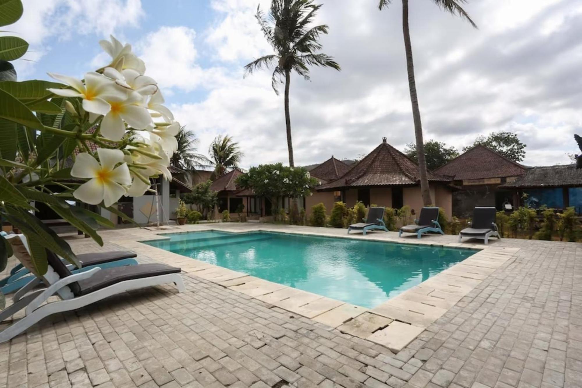 Gguesthouse Kuta  Exteriör bild